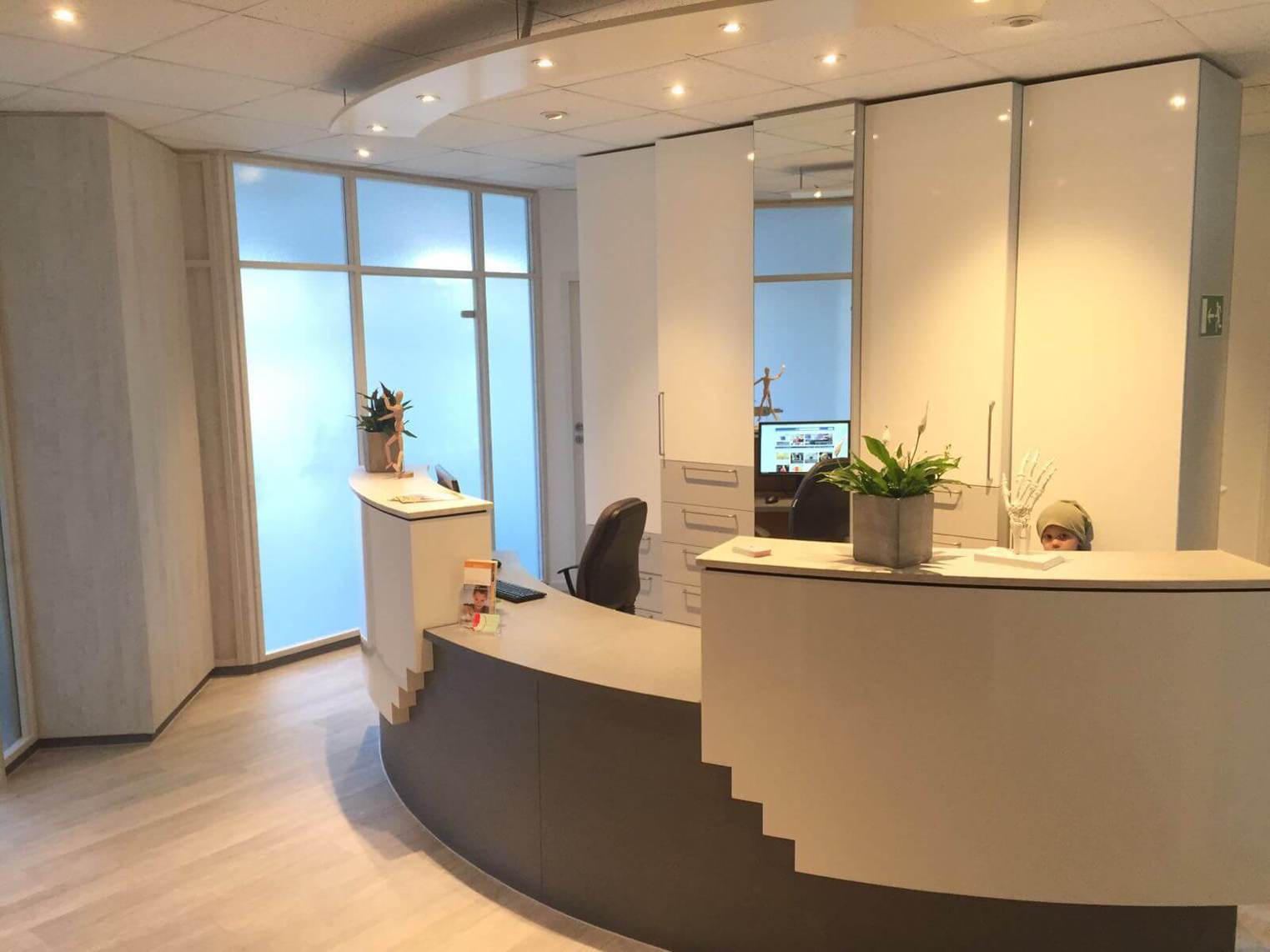 Affordable practice interior, reception area and furniture renovation in white and grey 01