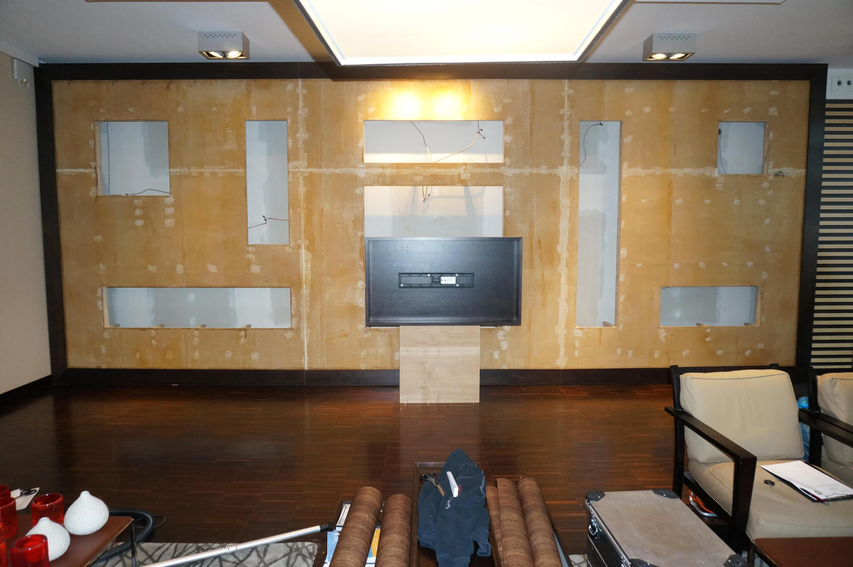Custom hotel interior design featuring a partition wall in the hotel lobby with W671 rustic wood-effect film - before